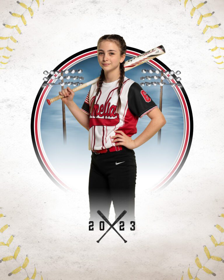 Middle school girl in softball uniform holding a bat over her shoulder