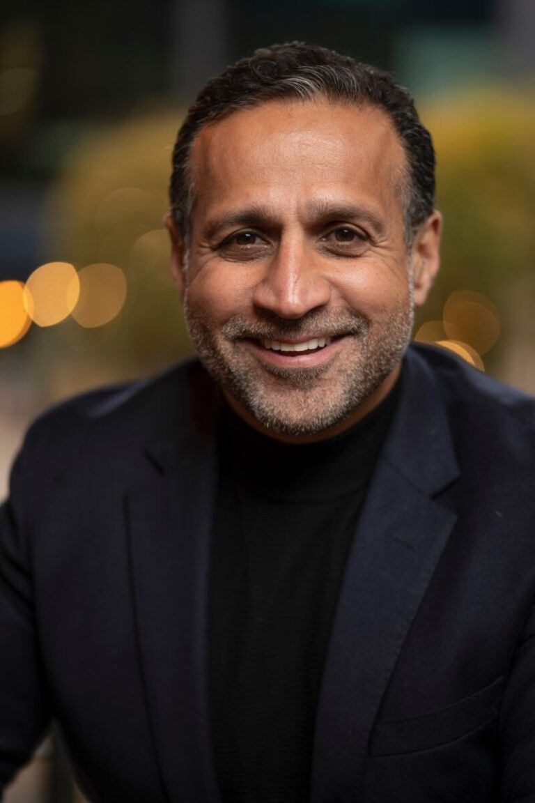 business man smiling for headshot