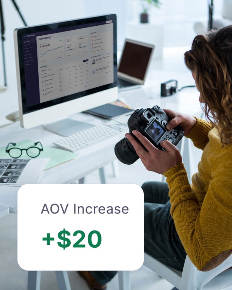 photographer at her desk with the gotphoto dashboard on her screen and an overlay stating her +$20 average order increase