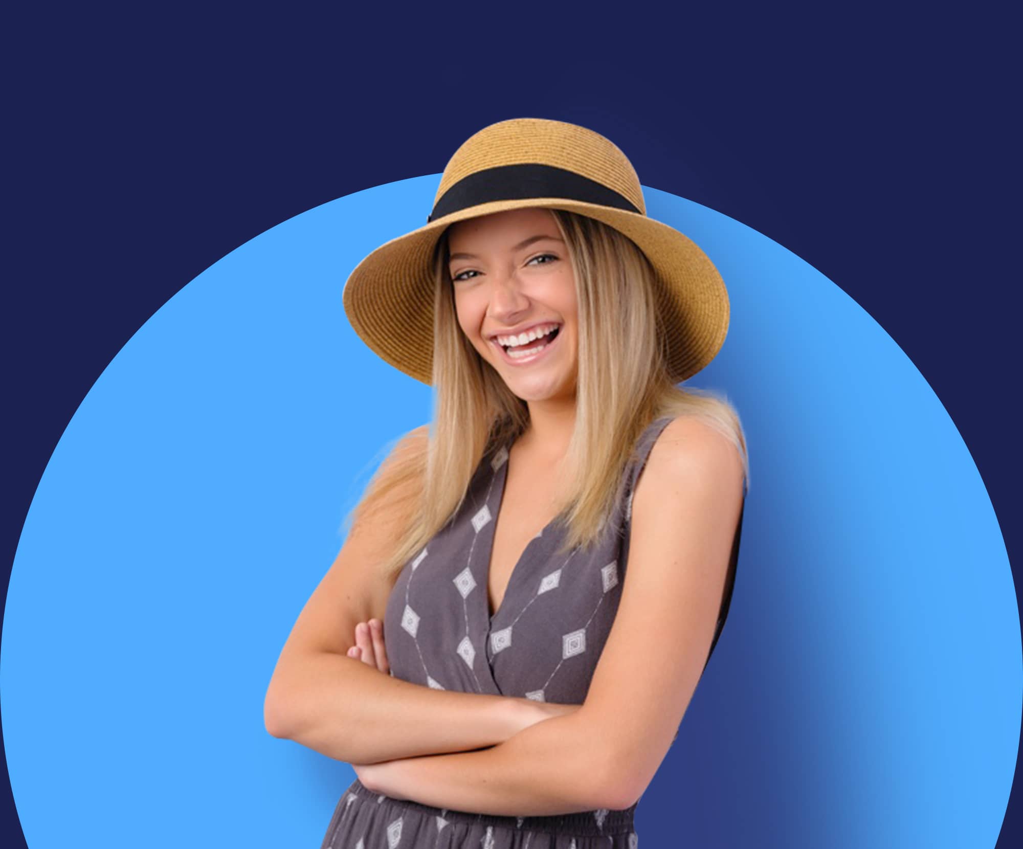 Smiling young woman in a hat posing for a senior portrait, highlighting senior photography