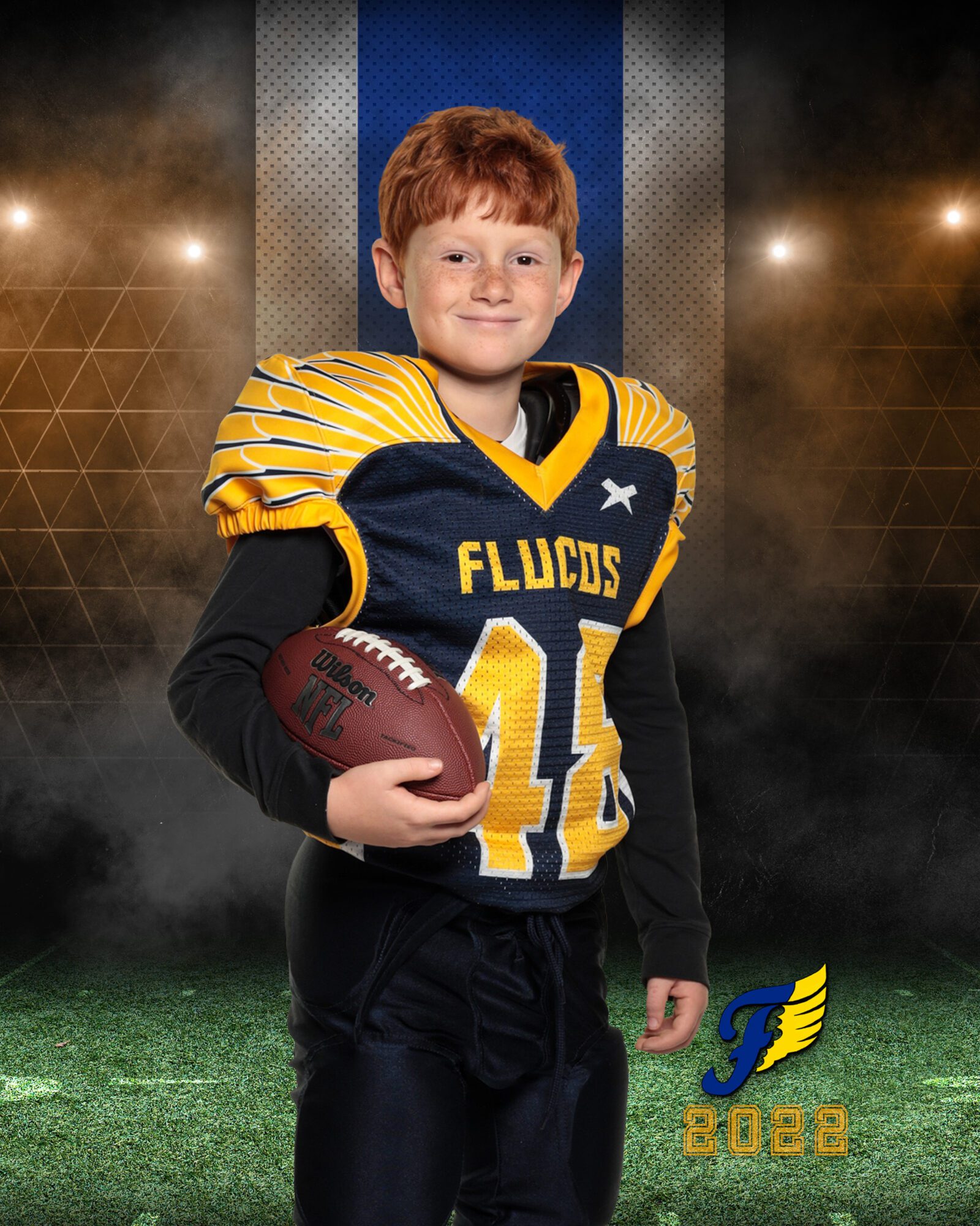 Child holding football